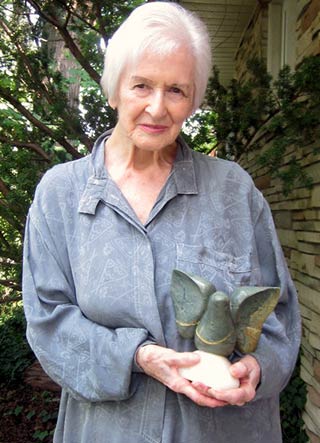 Long time member Joy McFadyen holding the Joy McFadyen Free Spirit Award